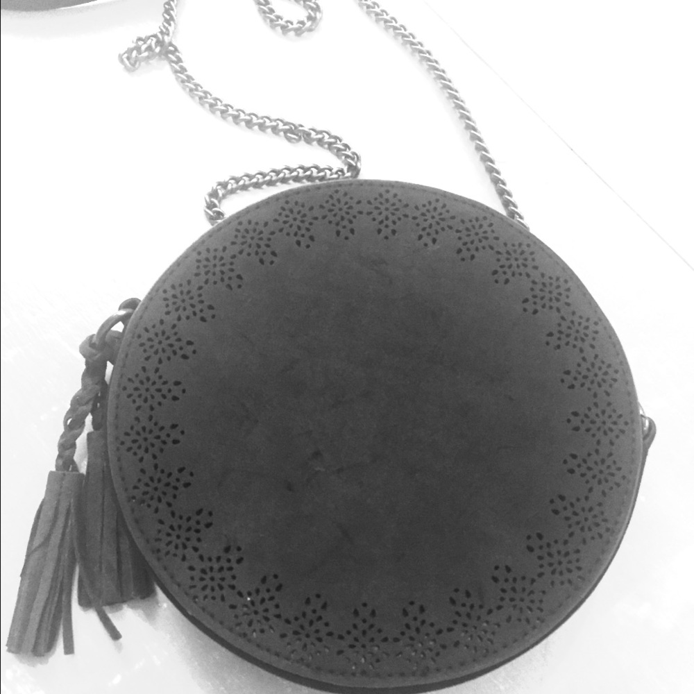 💟 Black, round, perforated suede handbag